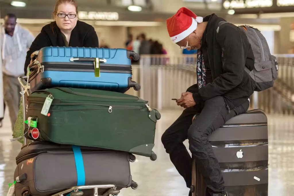 A crowded airport terminal during peak Thanksgiving travel season.